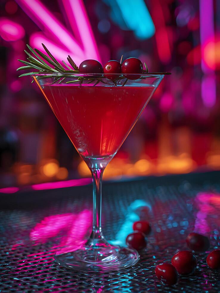 Cranberry Rosemary Martini Cocktail in Neon Light Setting. A close up image of a vibrant red cocktail garnished with cranberries and rosemary. photo