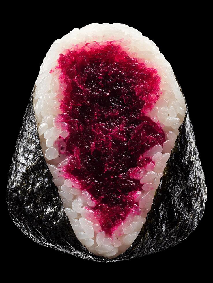 Close up of a Beetroot Onigiri Rice Ball. A vibrant image of Japanese cuisine. photo