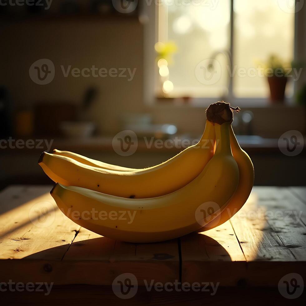 Bananas Resting on a Wood Table in Natural Light photo