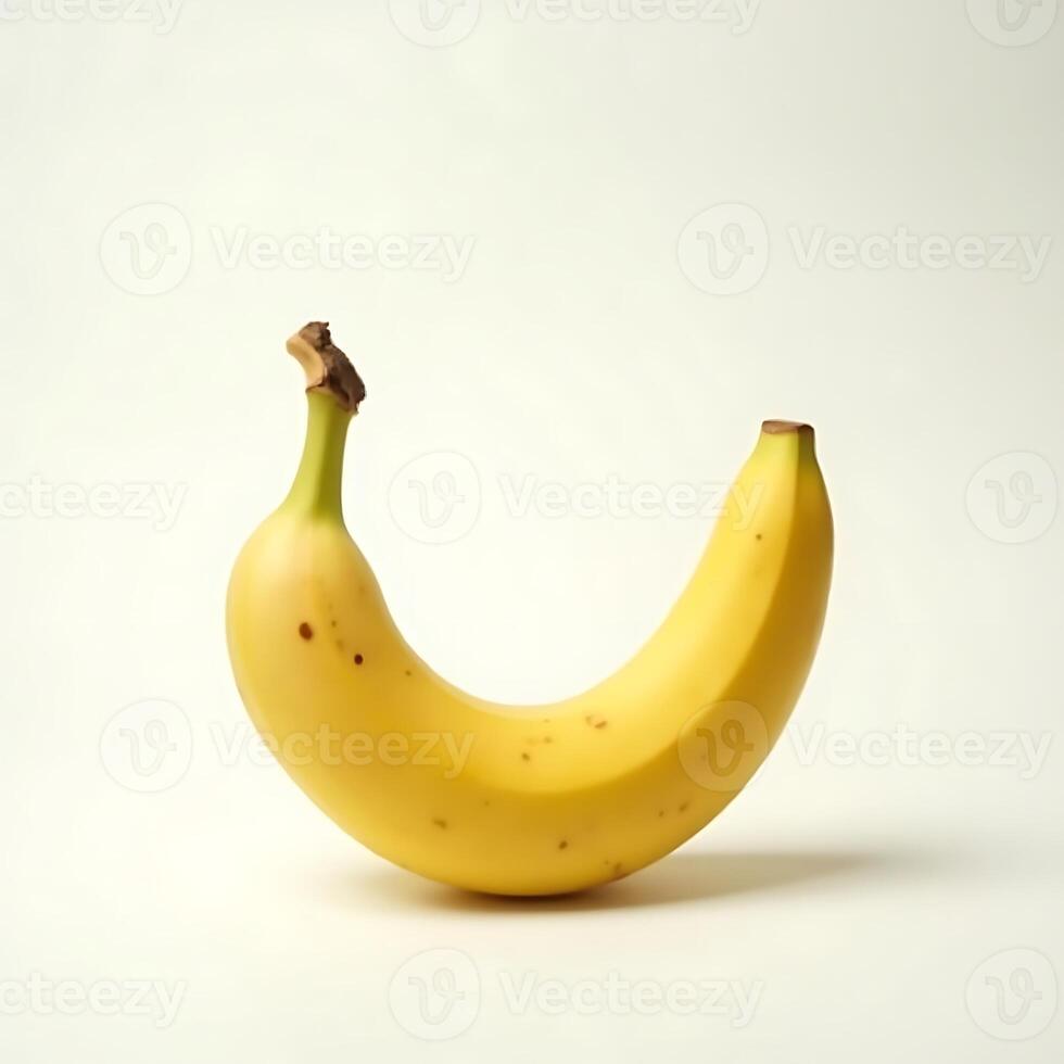 Single Yellow Banana Isolated on a Plain Background photo
