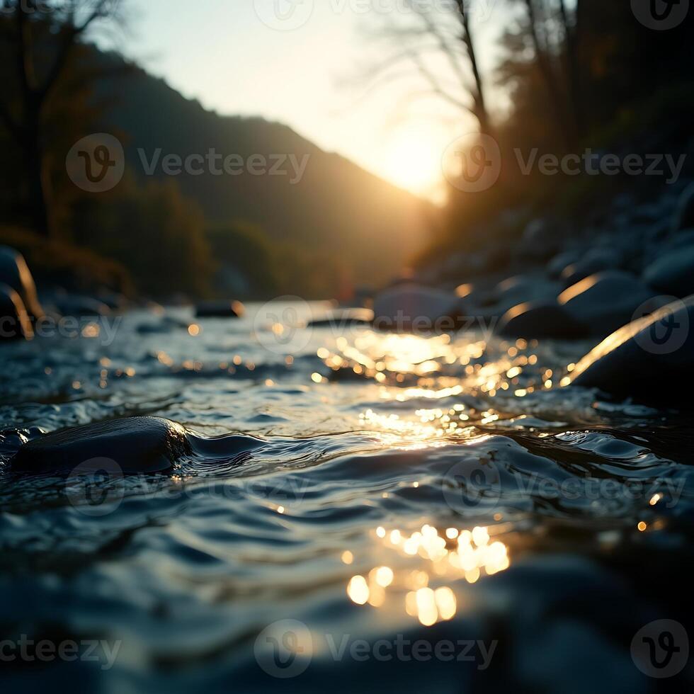 River Flowing at Sunset with Sun Glimmering on Water Surface photo