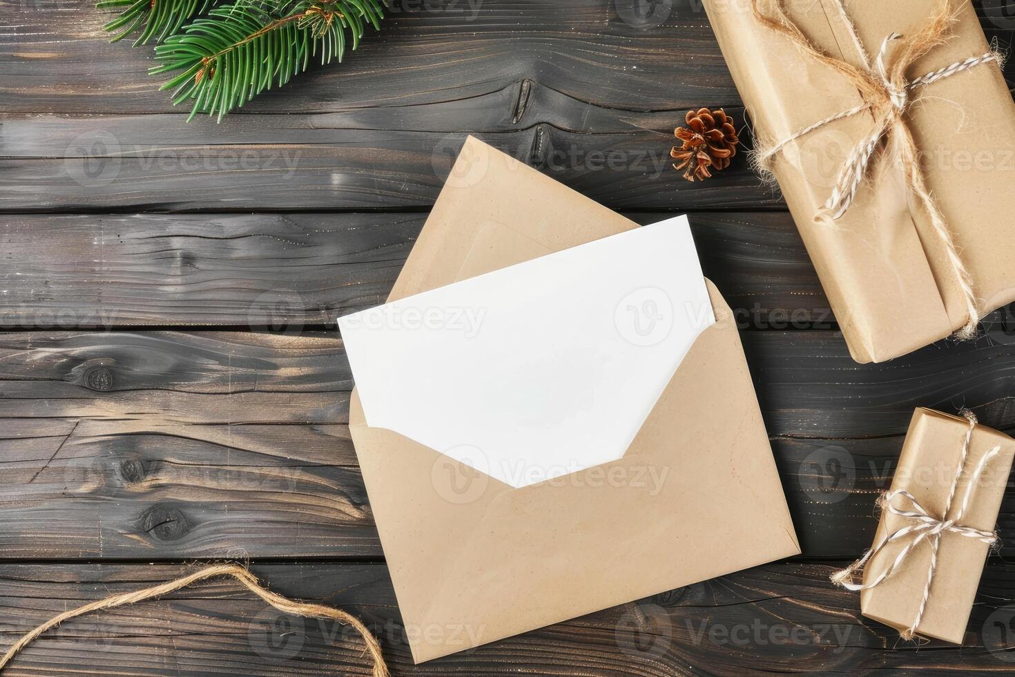 A brown envelope with a white card on a wooden table photo