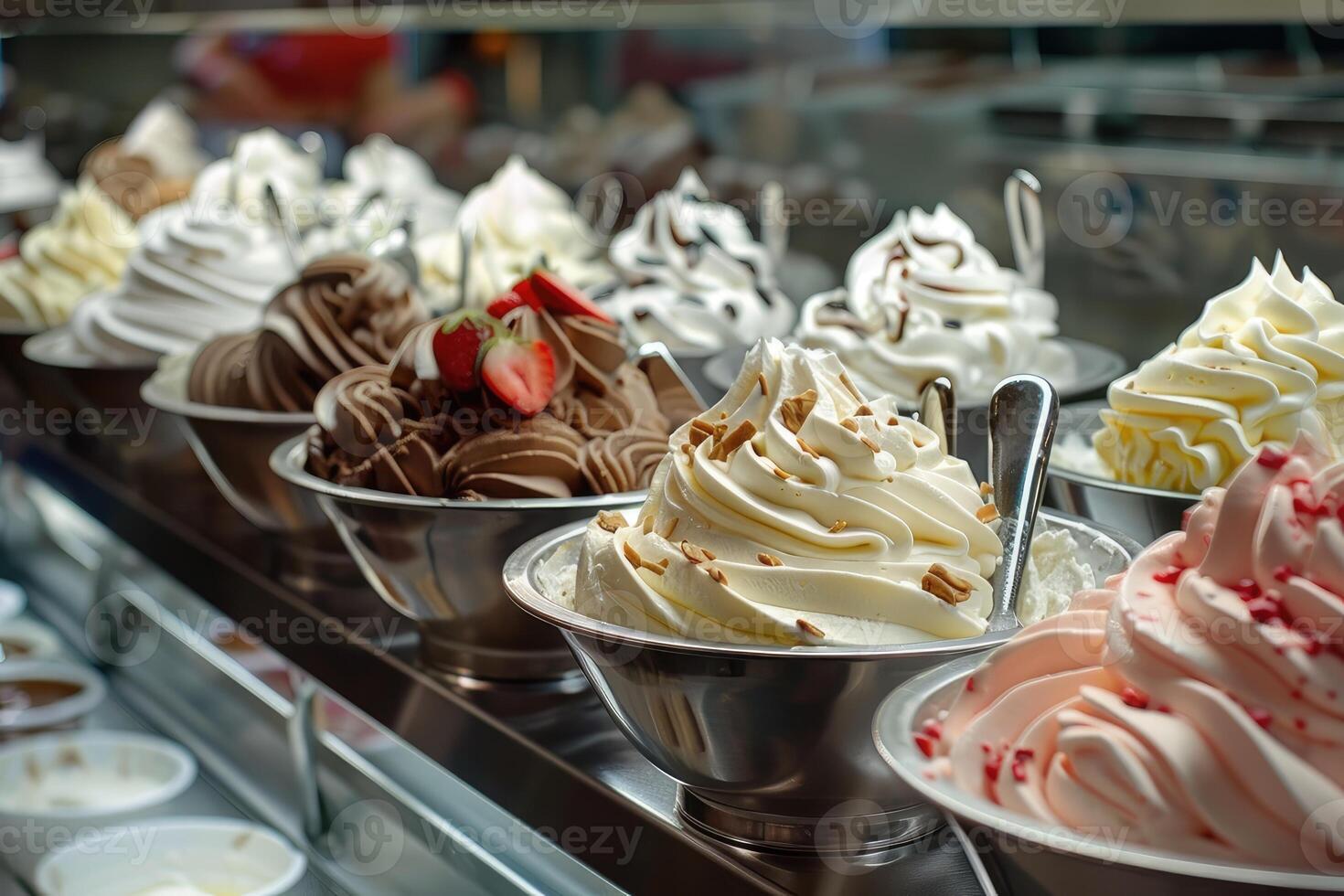 A colorful row of bowls filled with a variety of ice cream flavors photo
