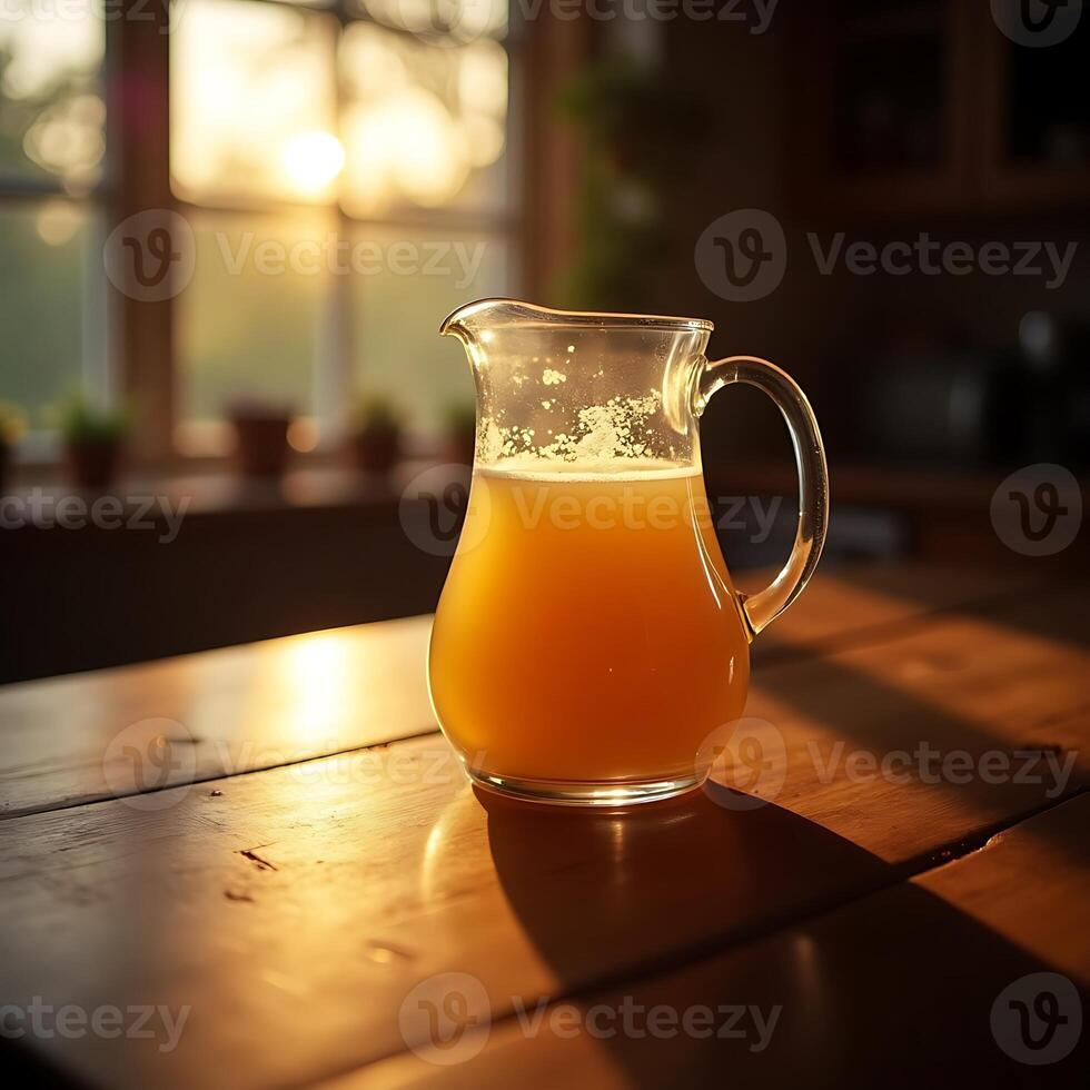 Pitcher of Fresh Juice on Wooden Table in Morning Sunlight photo