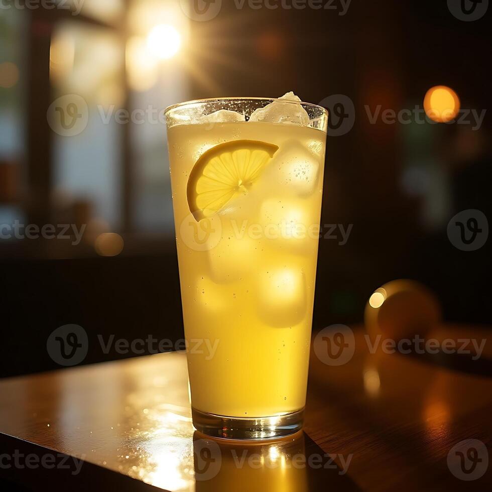 Refreshing Lemonade with Ice Cubes and Lemon Slice on Table photo