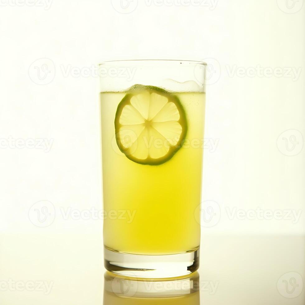 Refreshing Citrus Drink with Slice in Glass on White Background photo