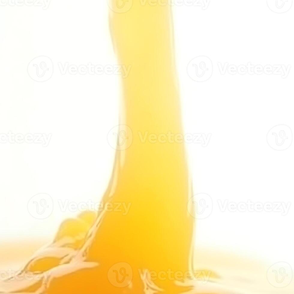 Pouring Golden Liquid Abstract on White Background photo