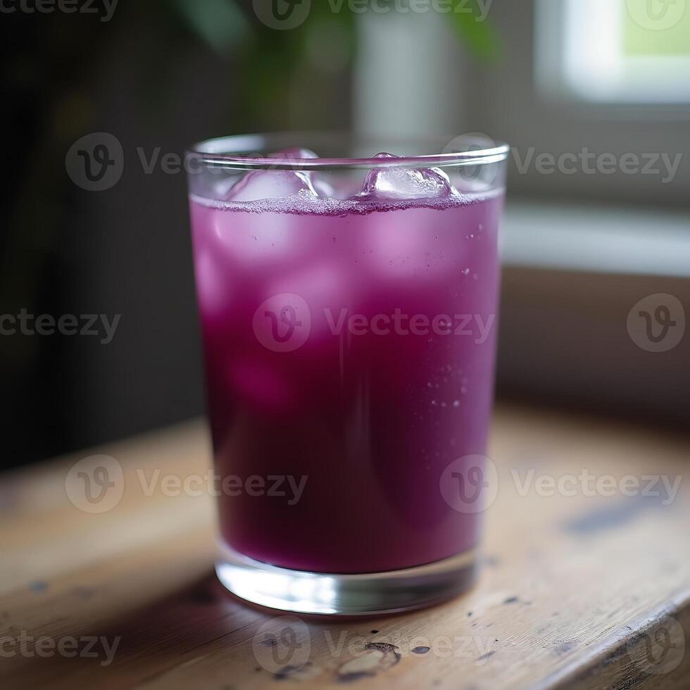 Purple Drink with Ice Cubes Refreshing Summer Beverage photo