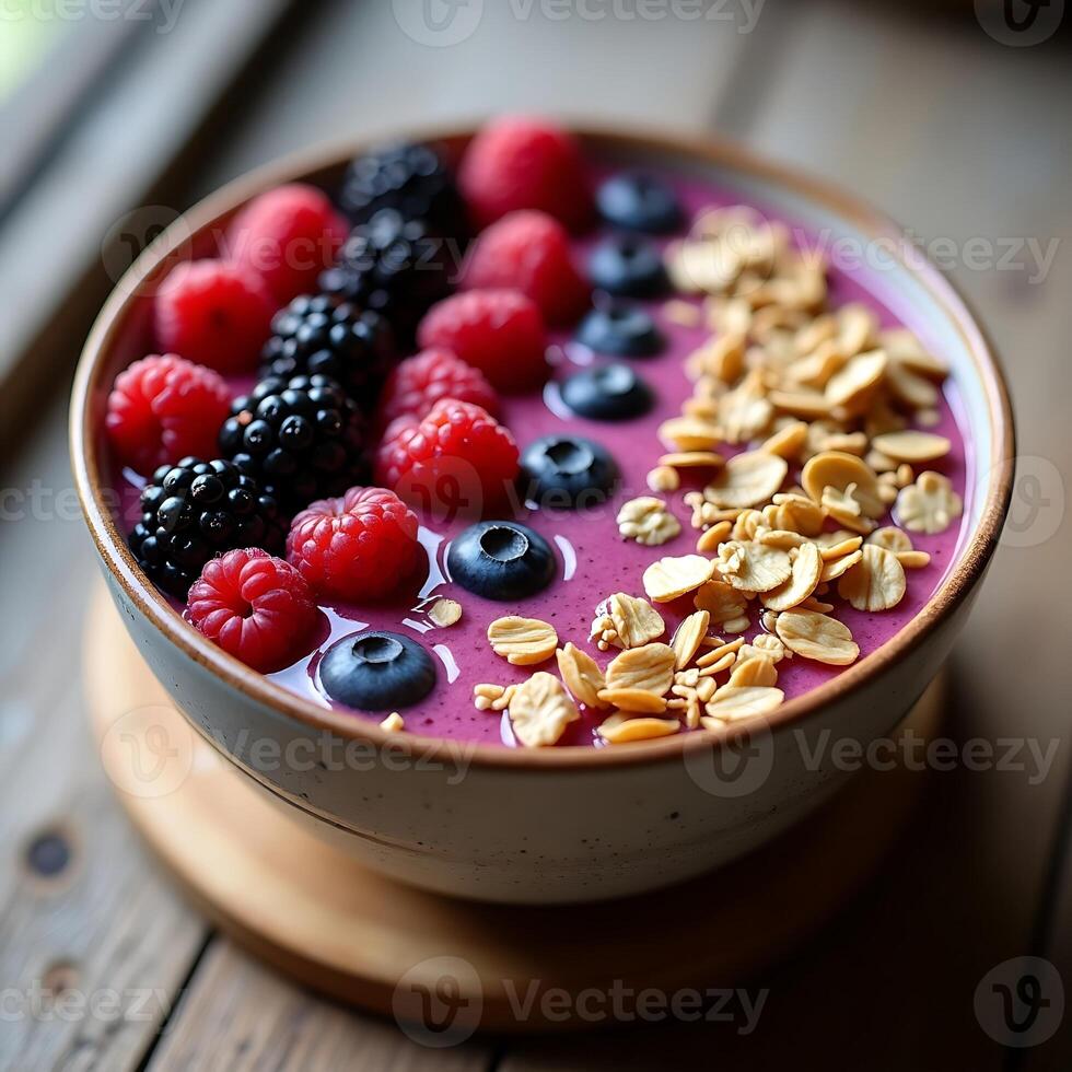 Berry Smoothie Bowl with Granola and Fresh Berries Topping photo
