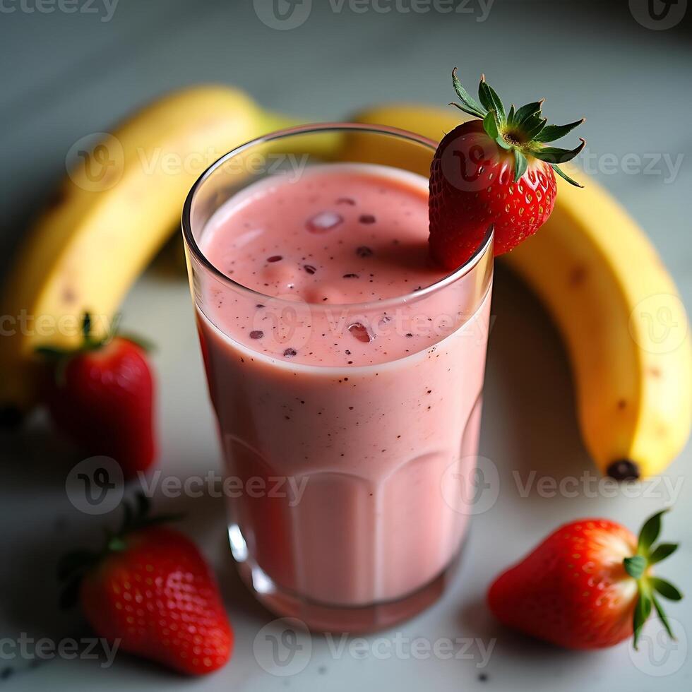 Drinking Strawberry Banana Smoothie with Fresh Fruit photo
