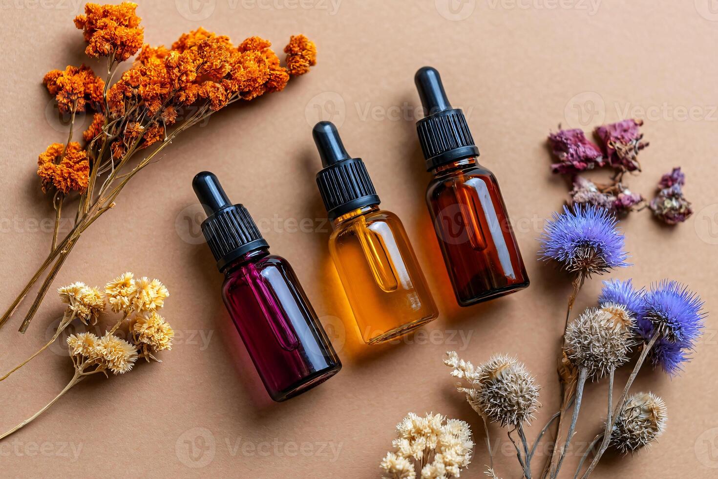 minimalist flat lay of essential oil bottles, dried flowers, calm mood background photo