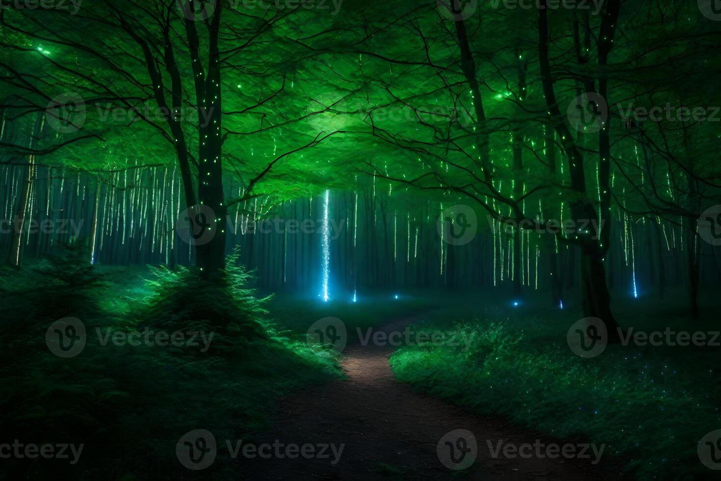 A path through a forest with glowing trees photo