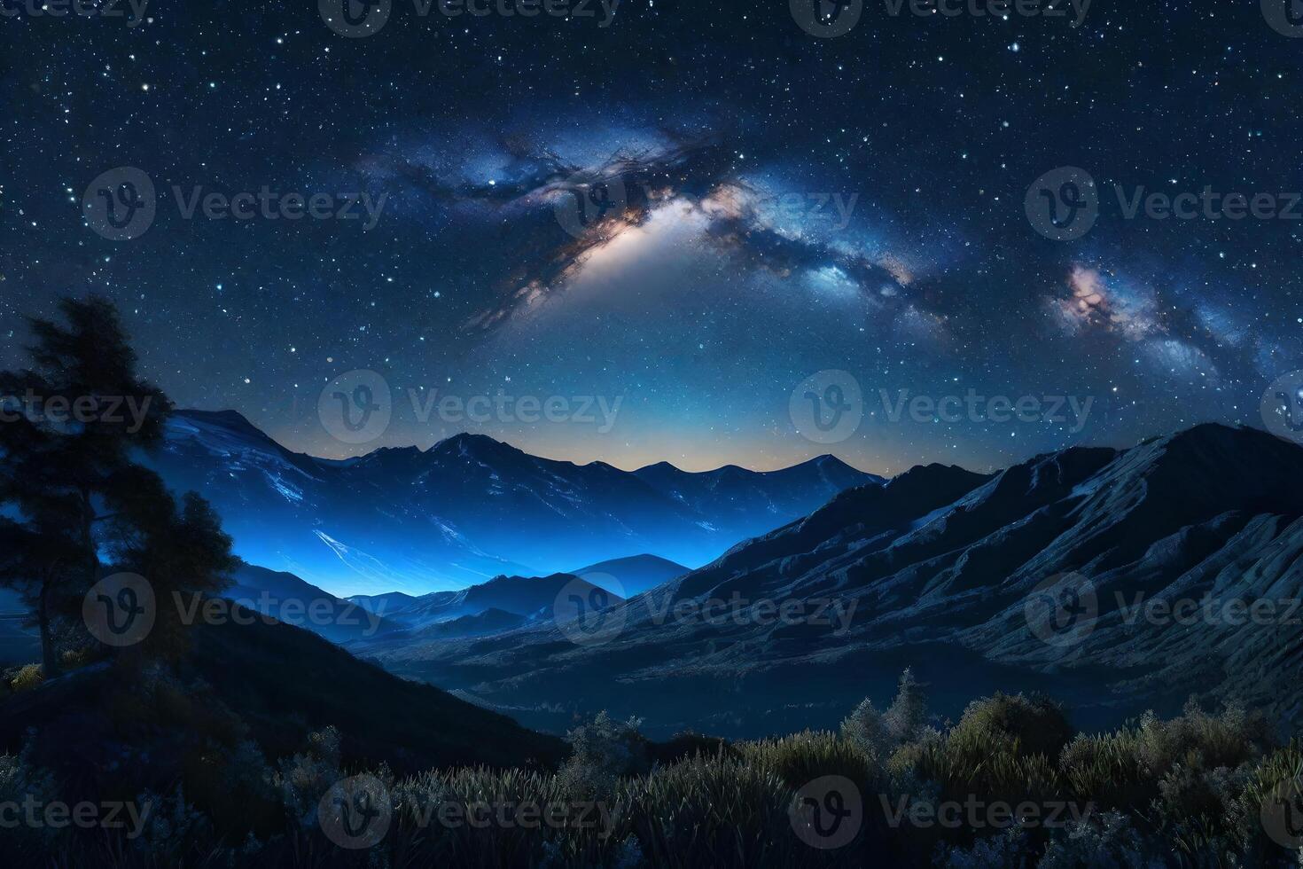 The milky way over mountains and trees photo