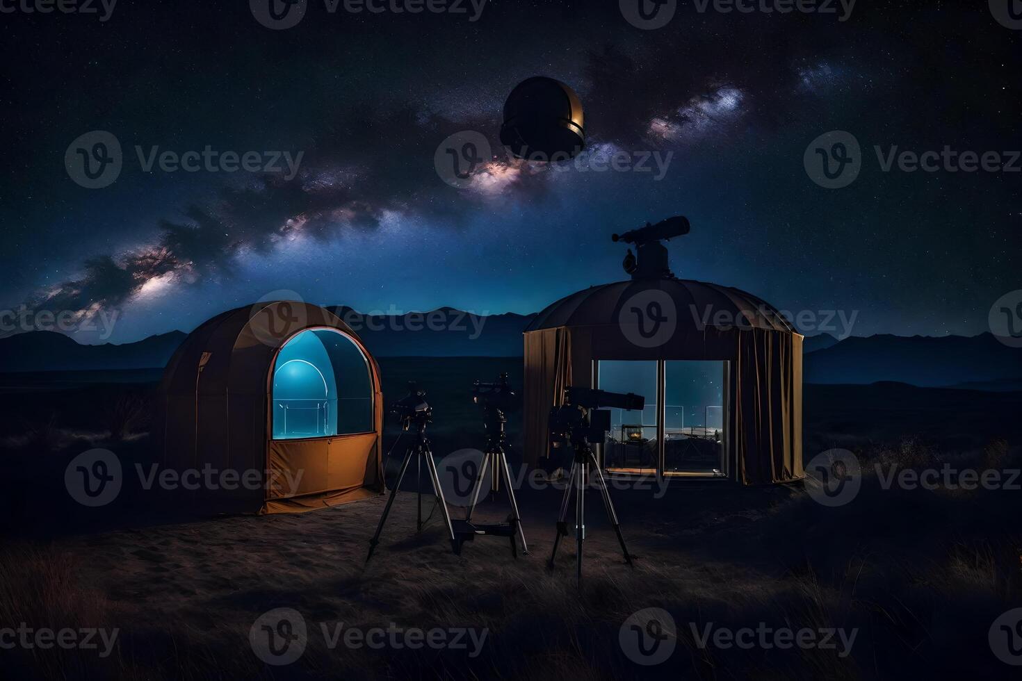Two tents with telescopes and a night sky photo