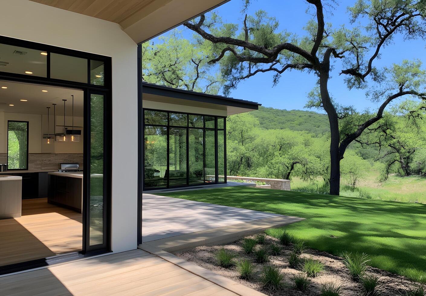 Modern home exterior with patio and scenic view. photo