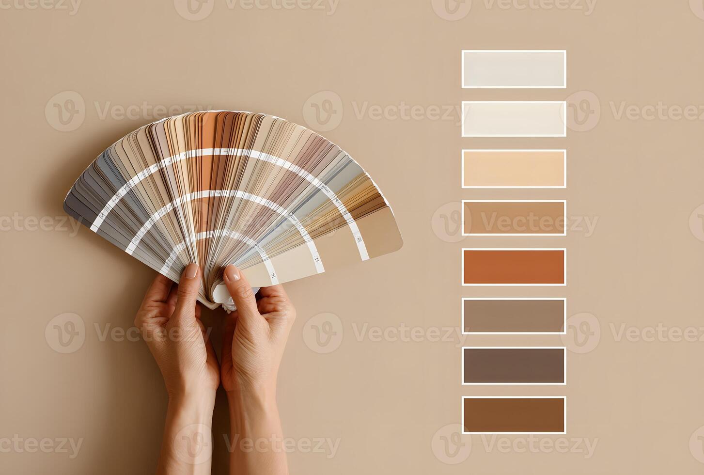 A color palette fan, displayed beside various neutral hues. photo