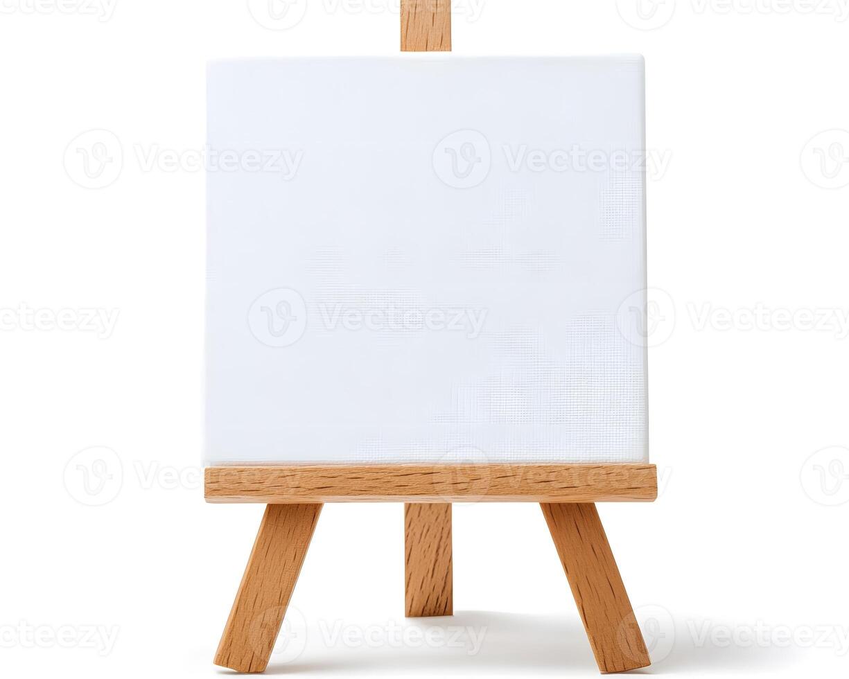 Small wooden easel with blank canvas. photo