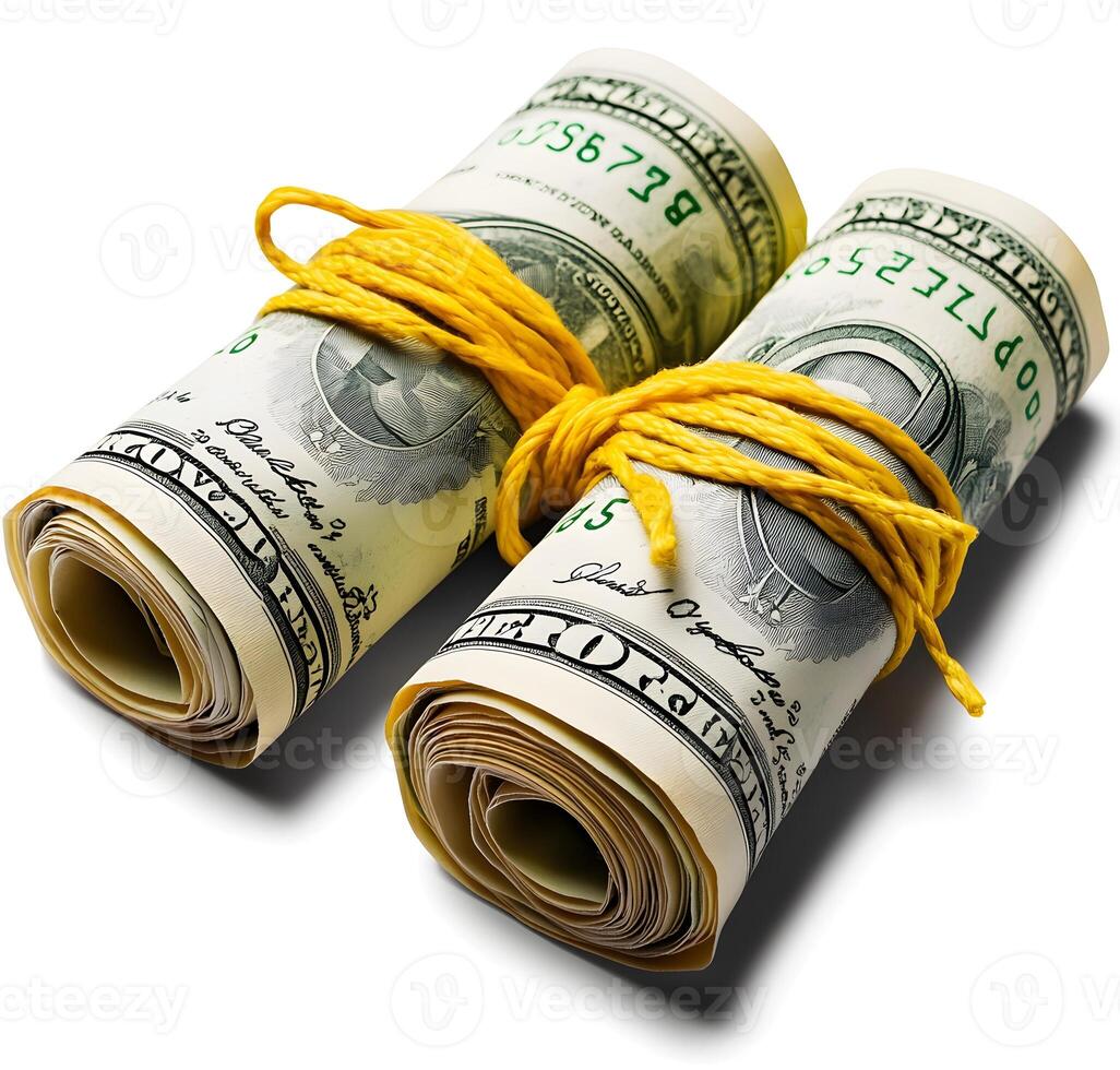 Rolled-up money tied with yellow string. photo
