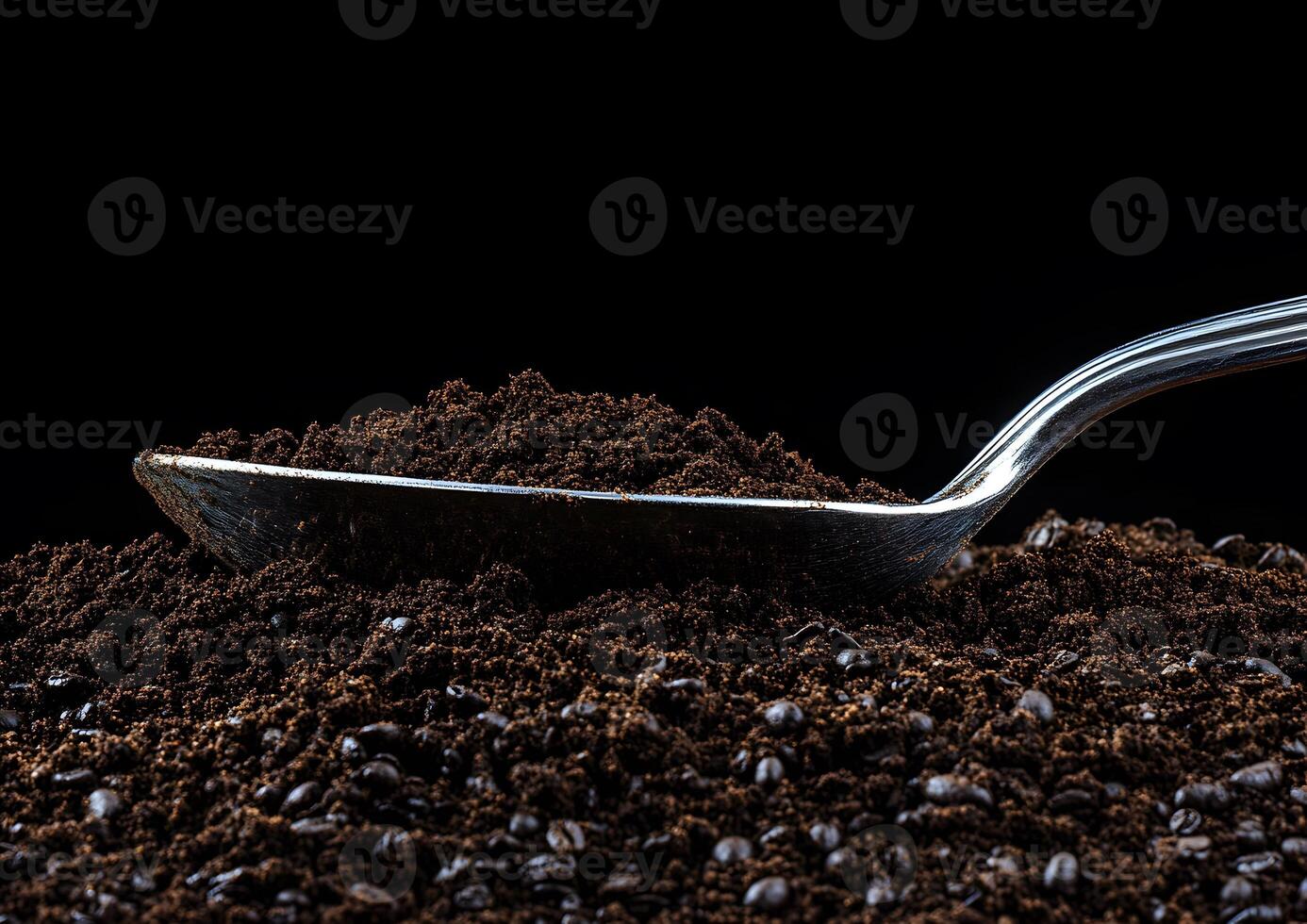 Ground coffee in a spoon. photo