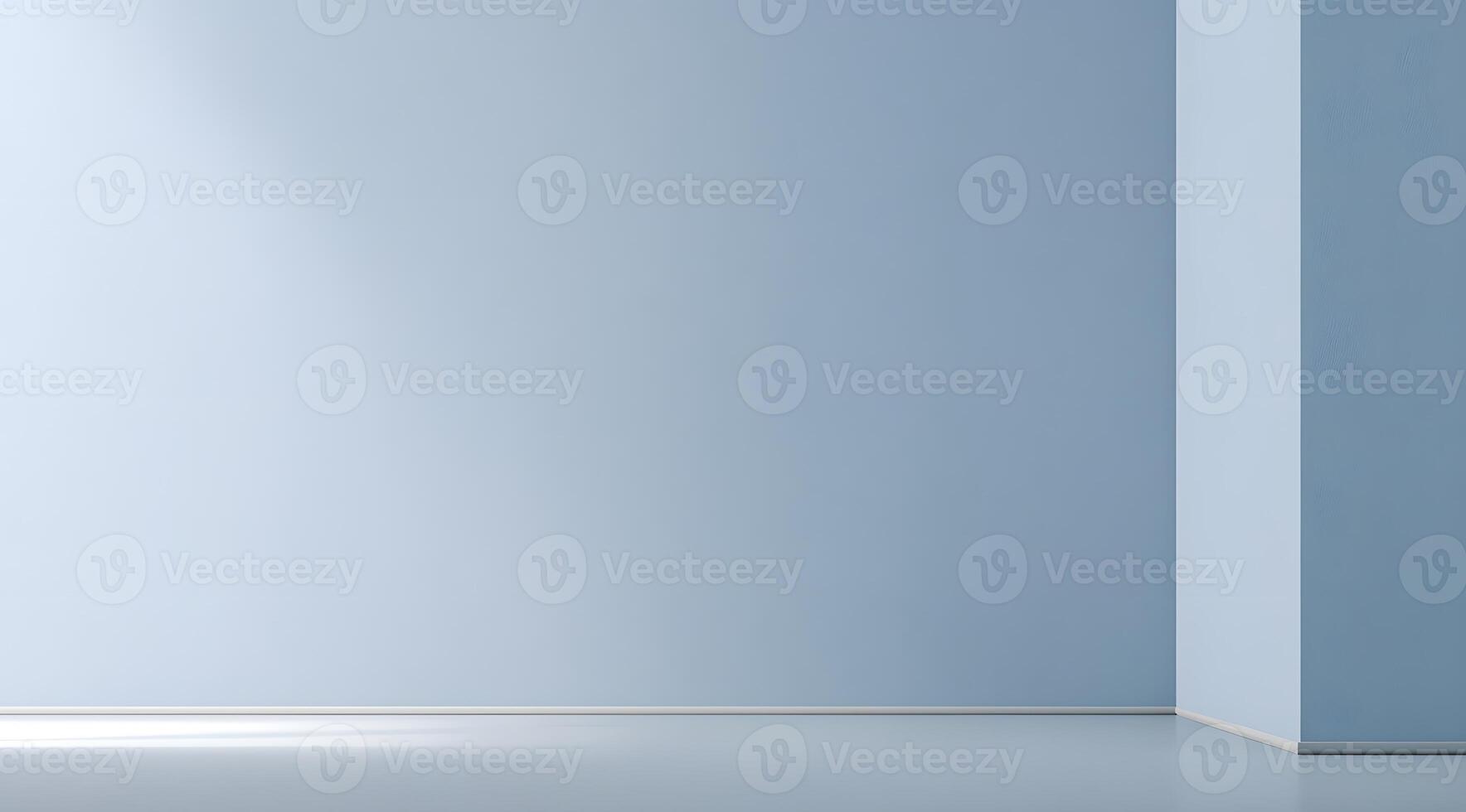 Empty light blue room corner with smooth walls and floor. photo