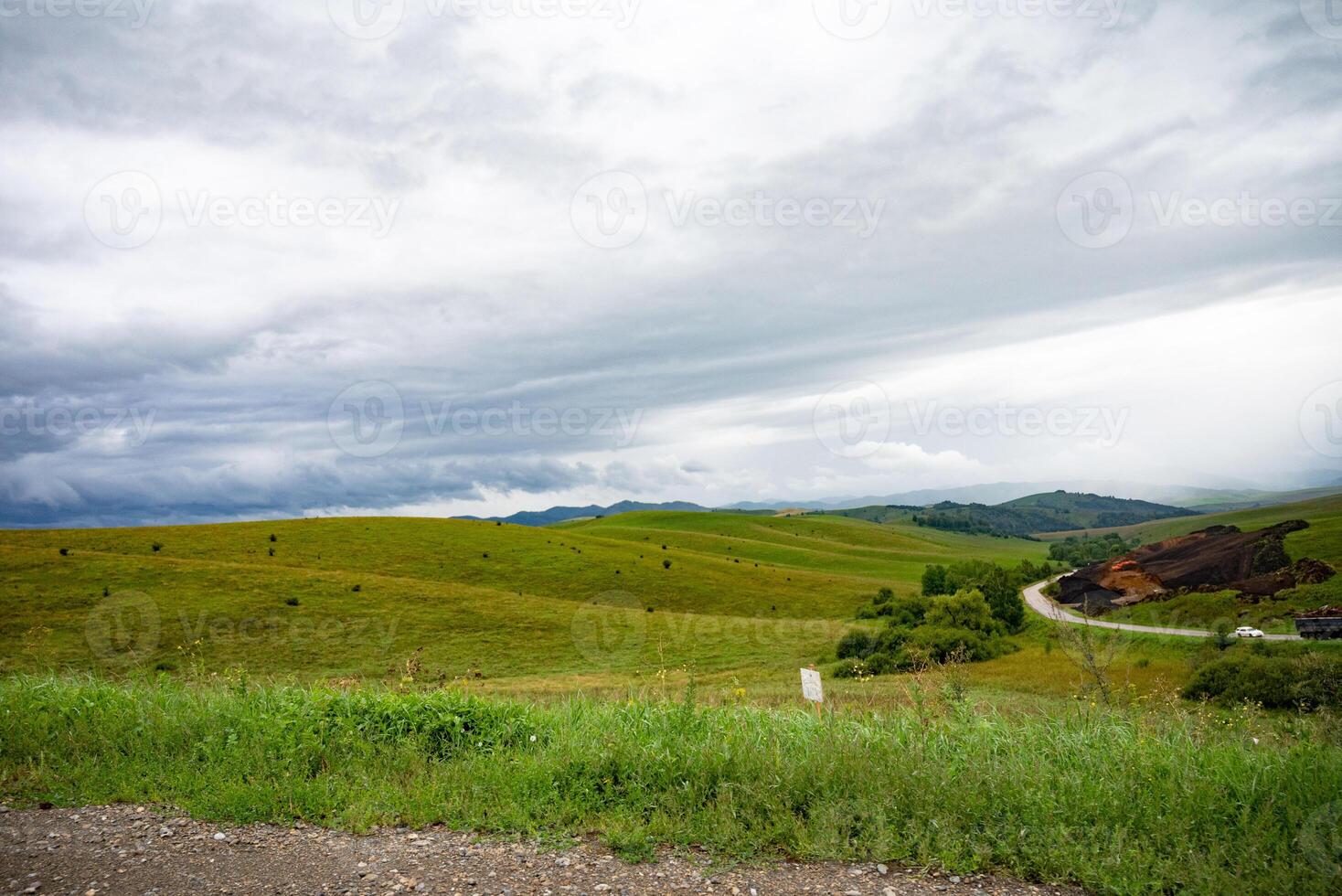 Scenic view of a lake with grassy banks. photo