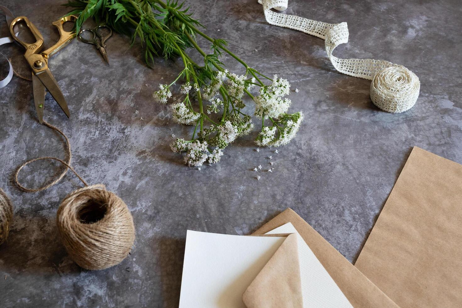 The background is a soft, light gray fabric that provides a subtle contrast to the white elements. photo