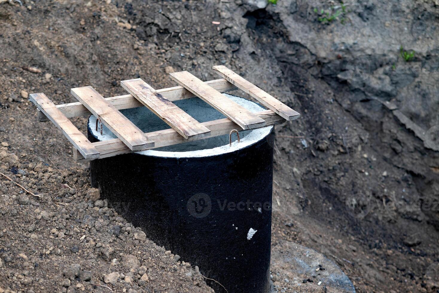 Foundation Blocks and Bricks Prepared for Building in a Rural Area During Daytime photo