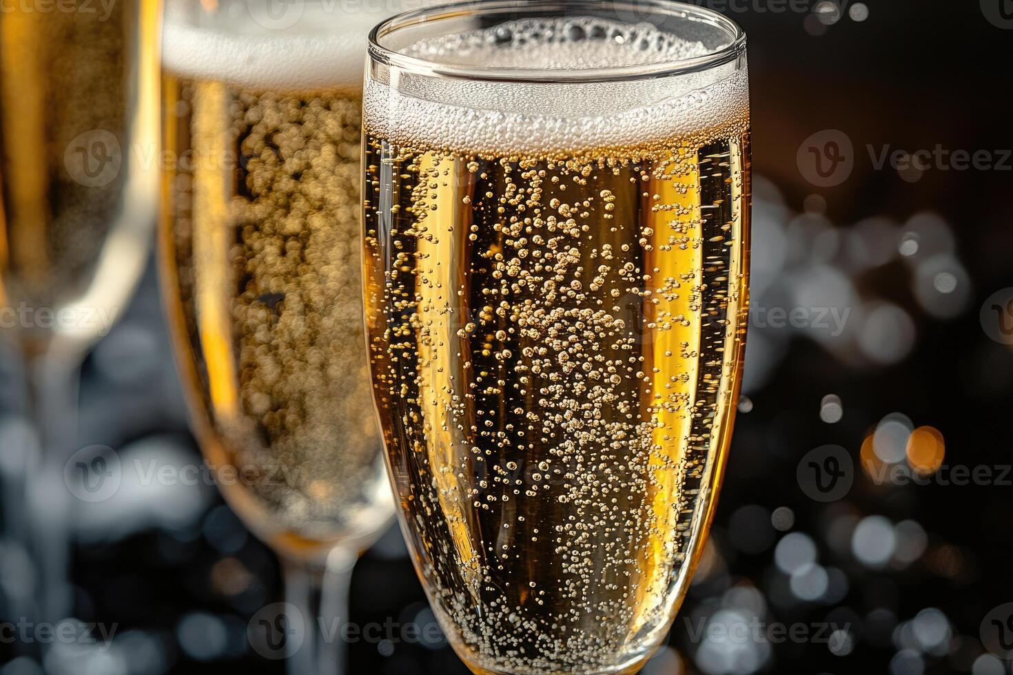 Sparkling champagne glasses in a celebratory close-up. photo