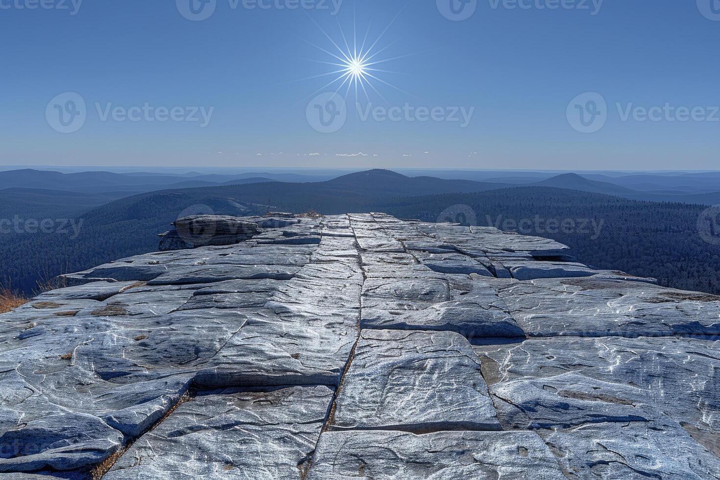 High mountaintop vista with paved stone path. photo