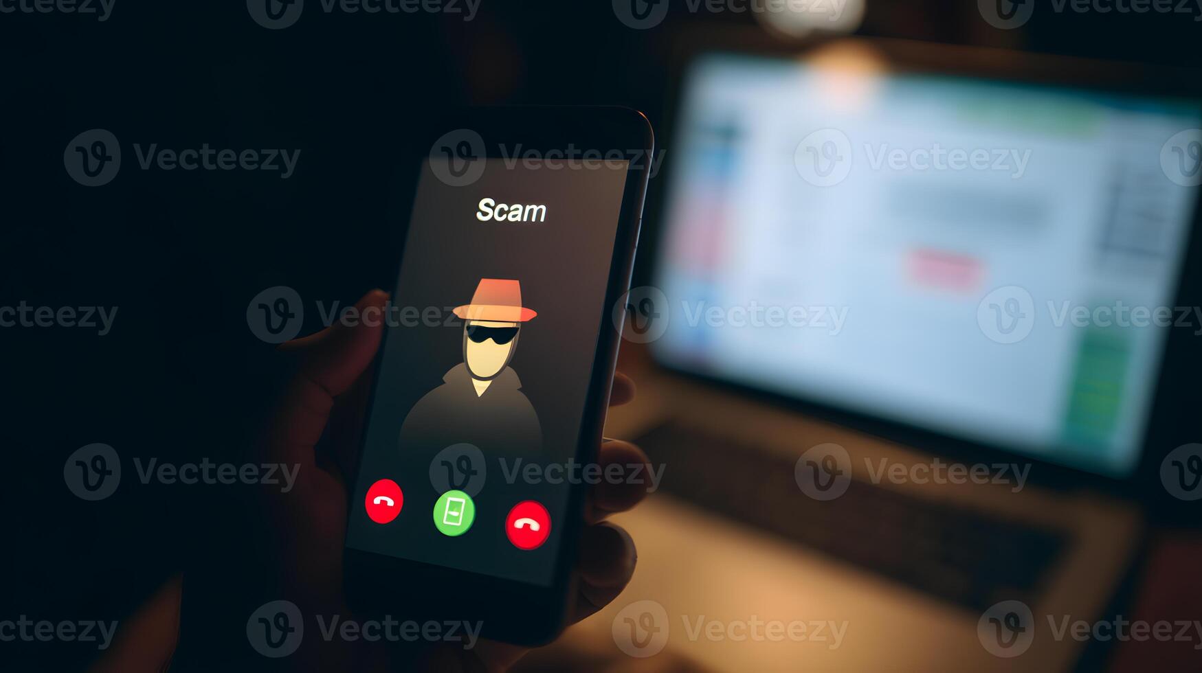 Hand holding smartphone showing incoming call labeled scam with masked anonymous scammer icon clearly visible photo