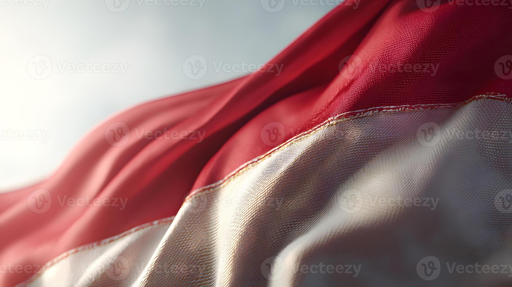 Detailed lifelike close view of the Indonesian flag with bold red and white stripes fluttering on fabric photo