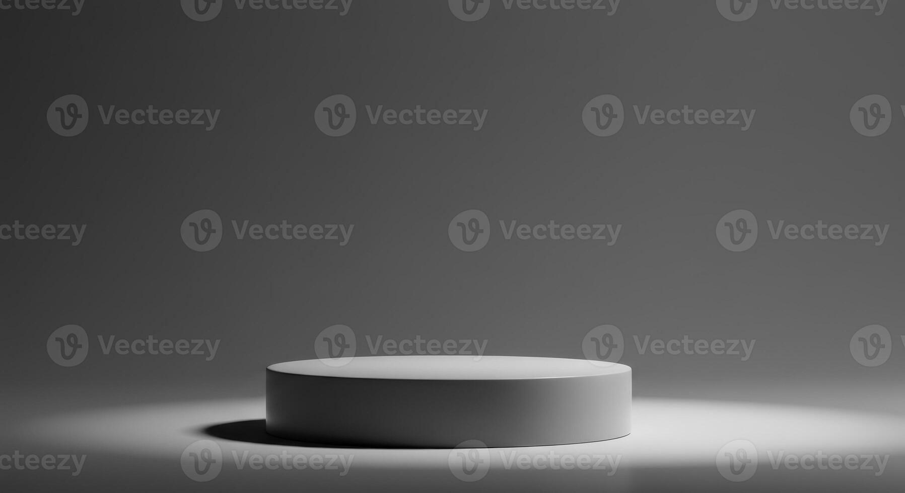 Minimalist presentation stage with a gray circular pedestal and soft spotlight on dark gray photo
