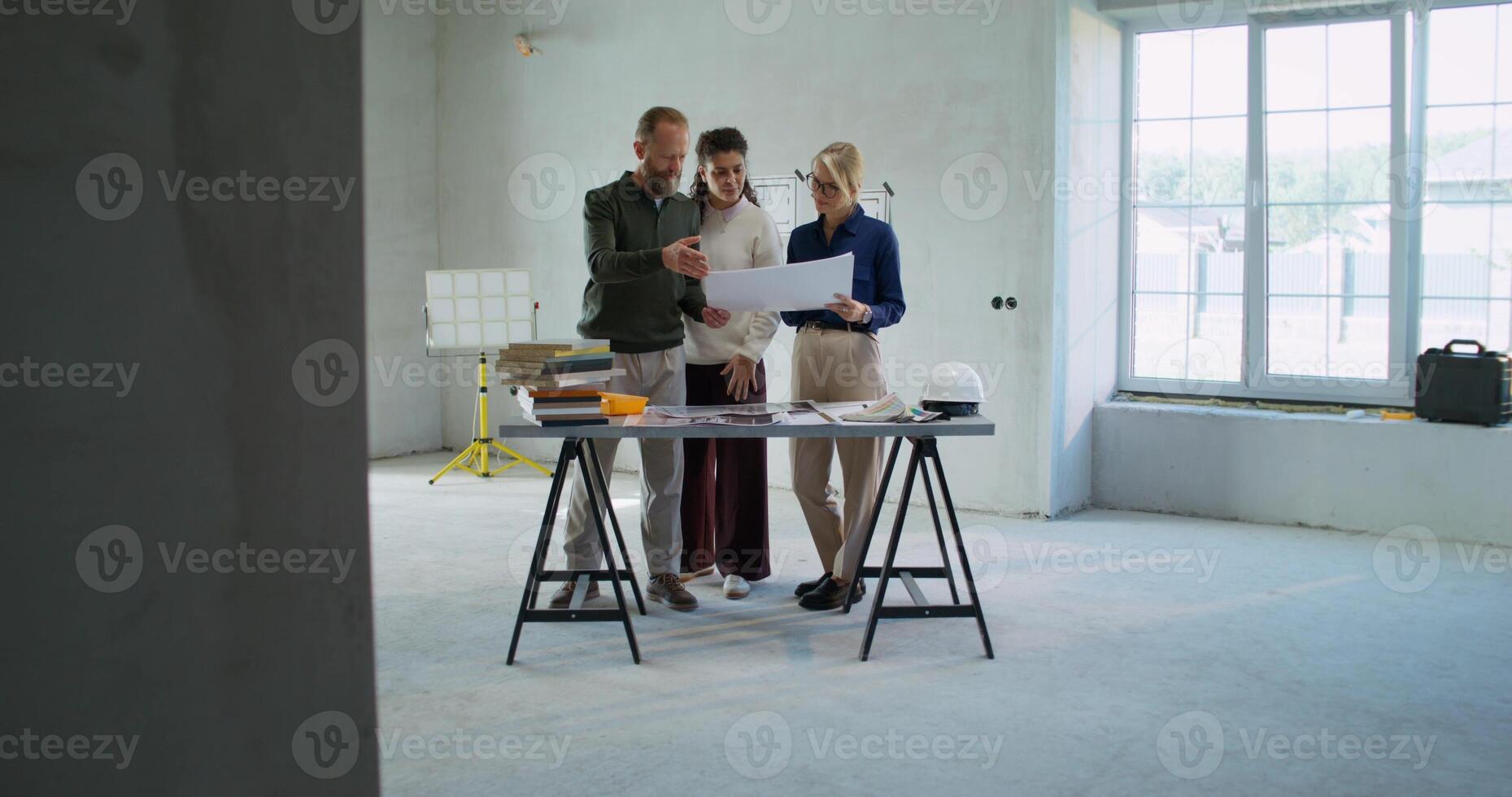 Designer's work with clients. Coordination of the project with a married couple photo