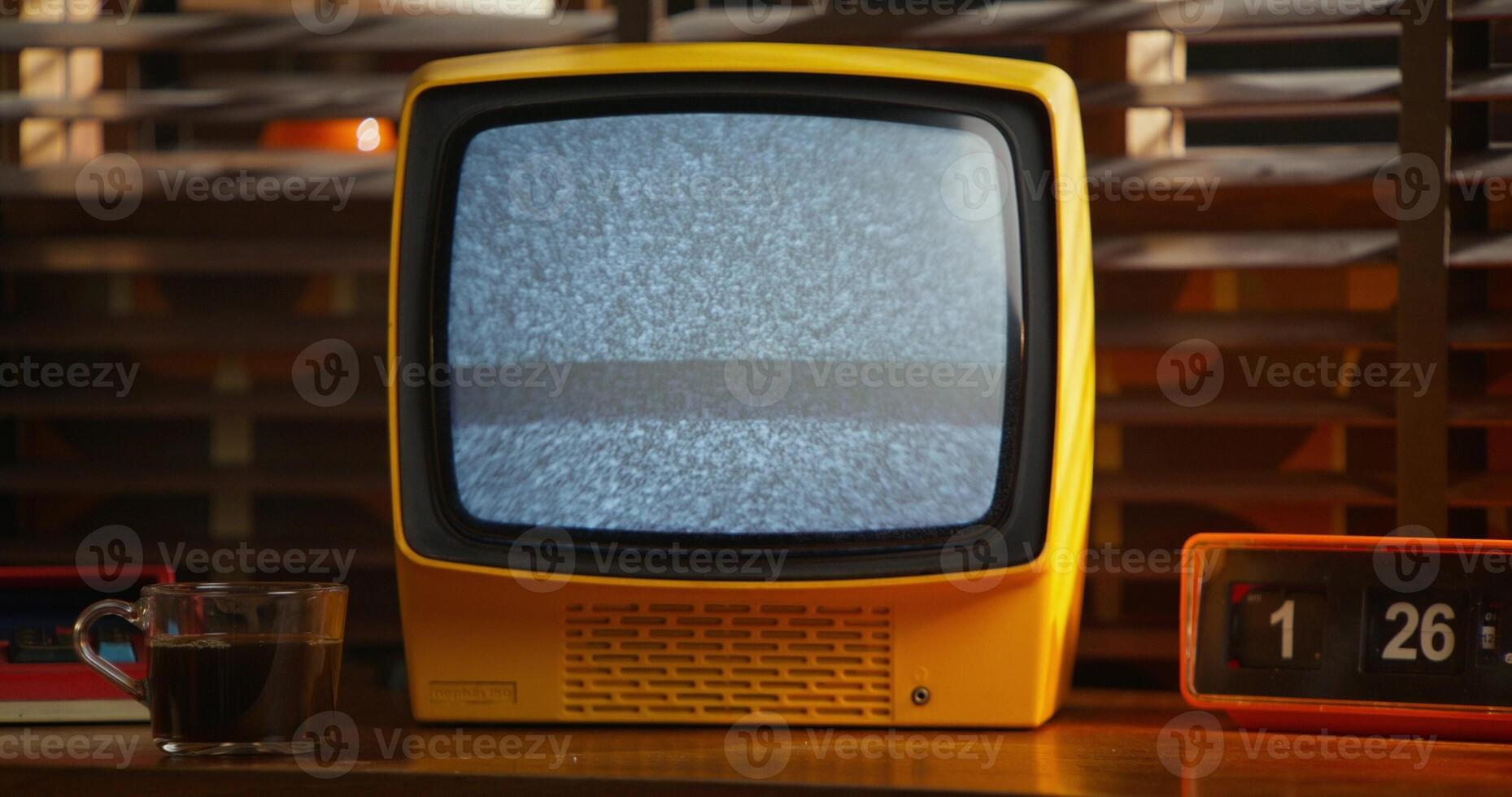 A monitor with ripples on the screen. Interior details in a retro office. photo