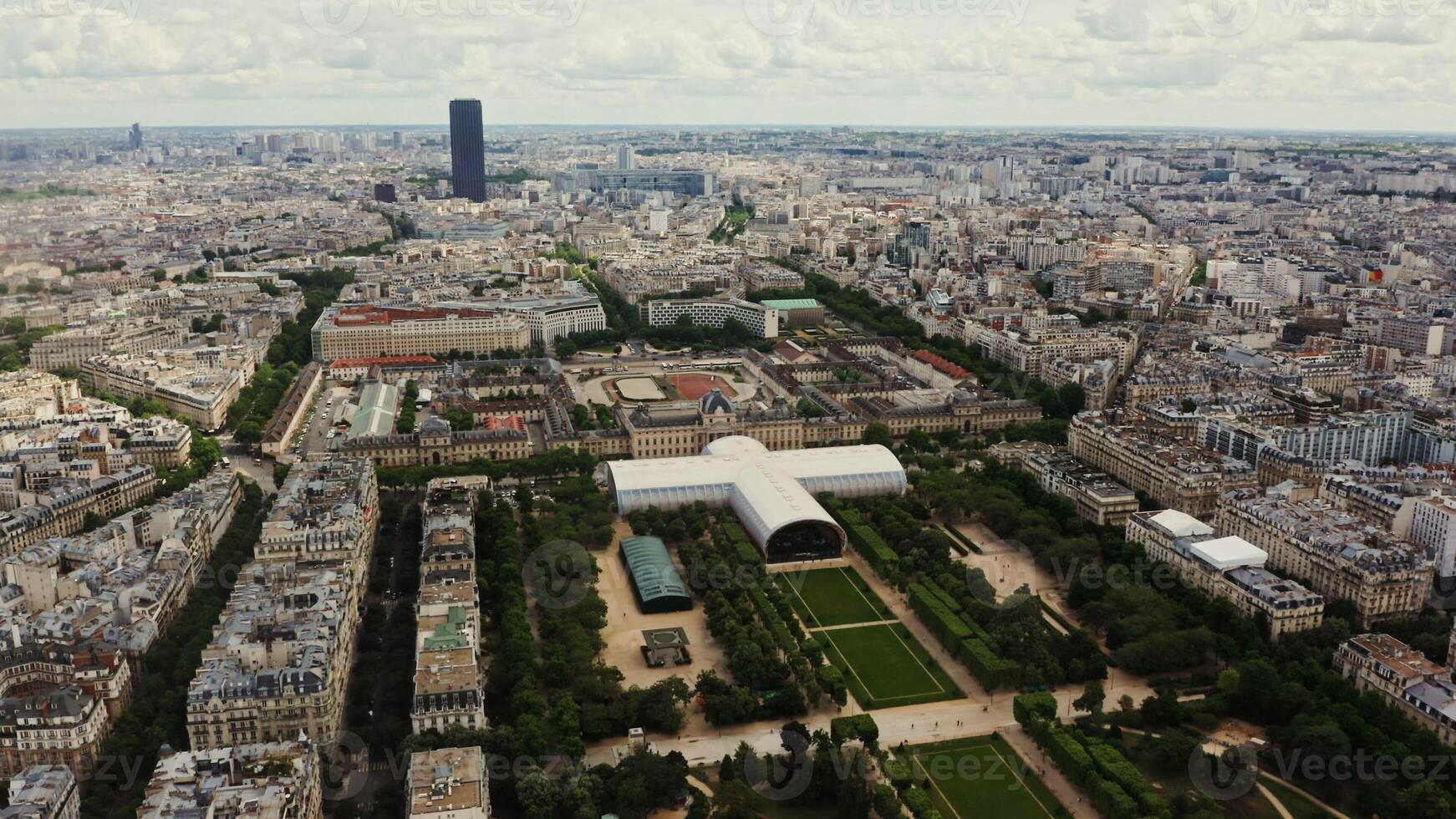 Cityscape of Paris from a bird's eye view. Drone flies in the historic city center over the Champ de Mars and an Ecole Militaire, France, Paris photo