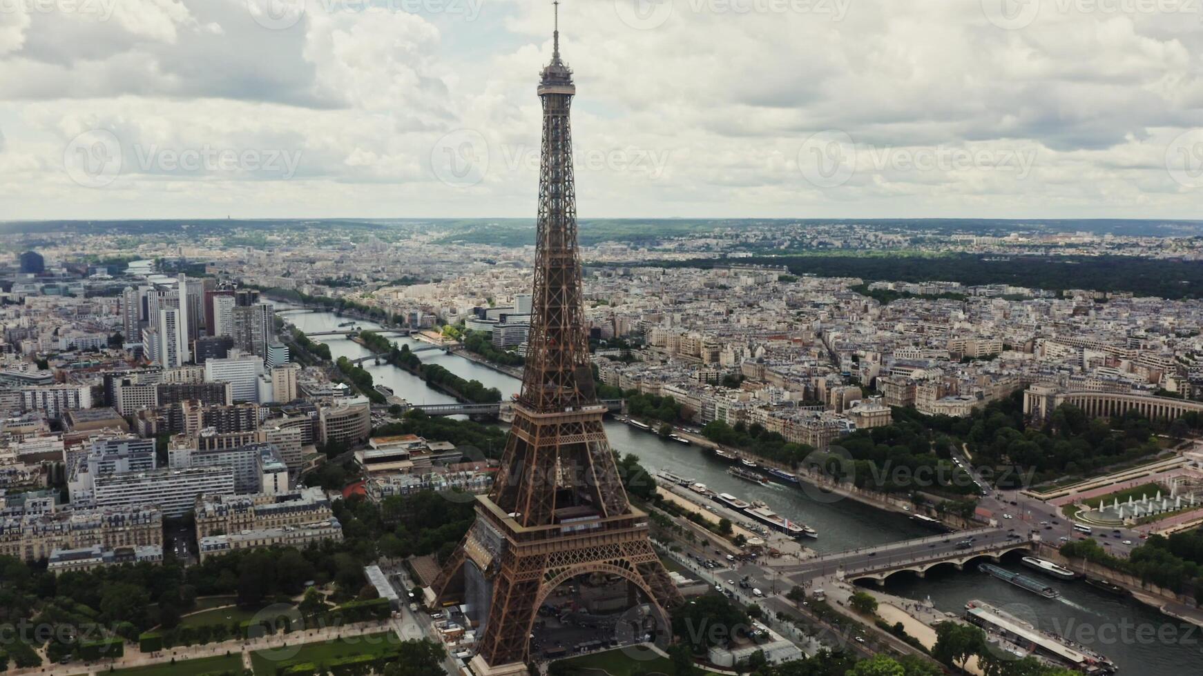 General view of the historic center of Paris with the Eiffel Tower and the river Seine on a cloudy summer day. Drone bird's eye view , France, Paris photo