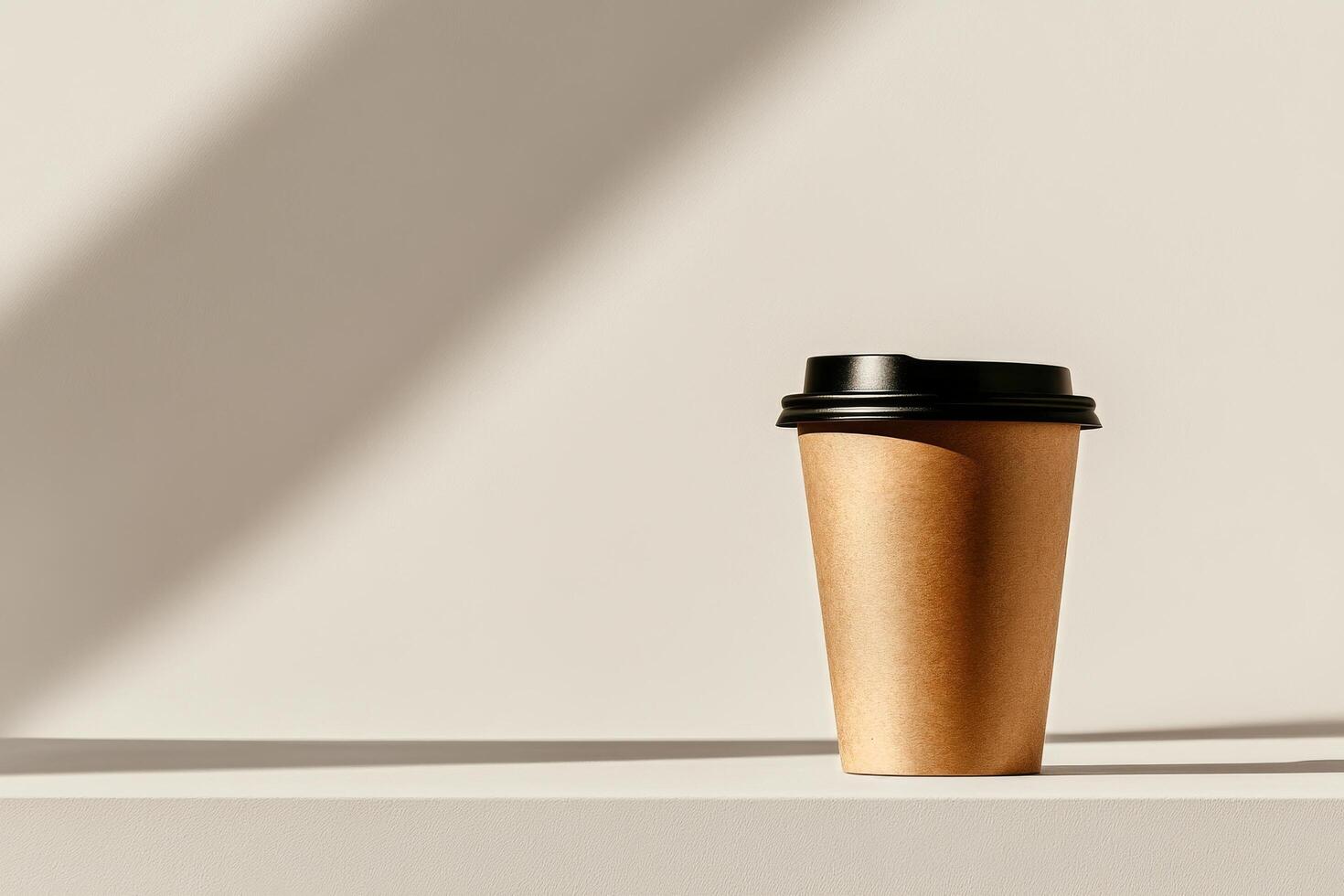 Coffee Cup With a Black Lid on a Minimalistic Surface With a Palm Shadow in the Background at Morning Light. photo