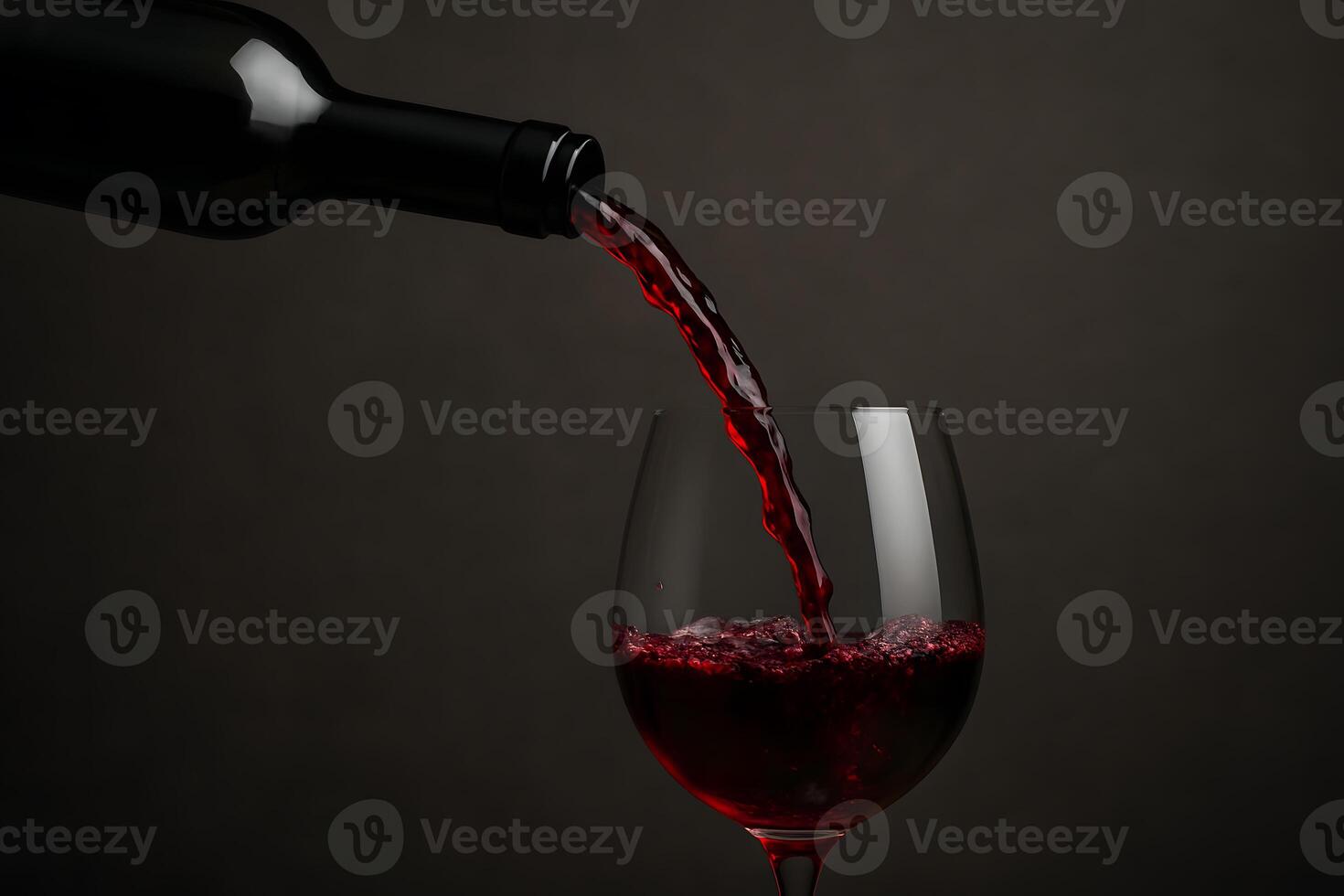 Red wine pouring into a glass photo