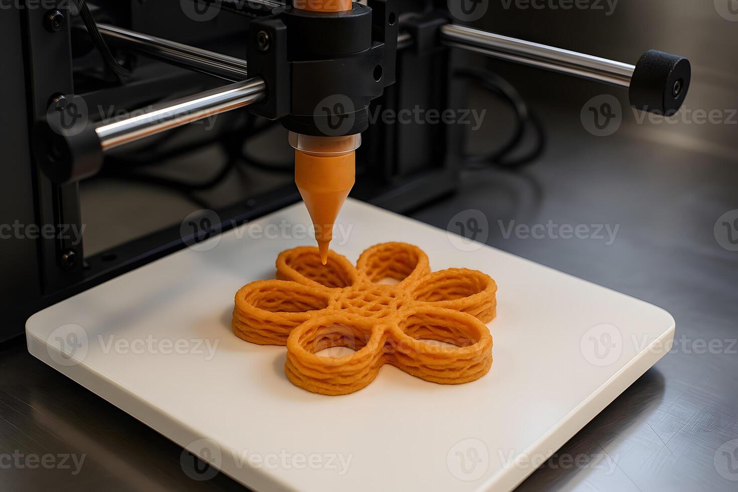 A 3d printer is making a flower out of dough photo