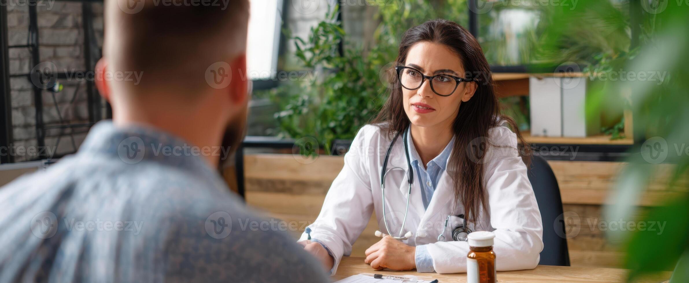 The doctor consulting a patient in a modern healthcare environment. photo