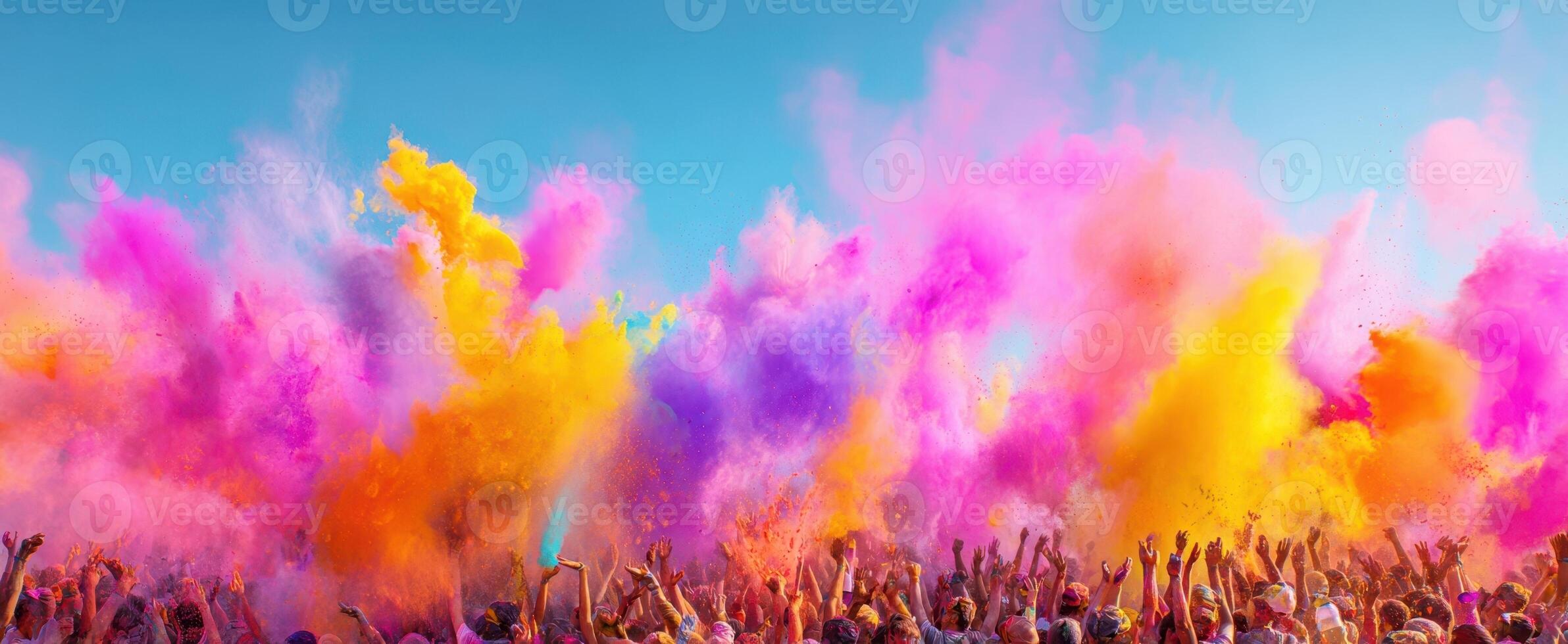 The vibrant celebration of colors at a lively festival atmosphere. photo