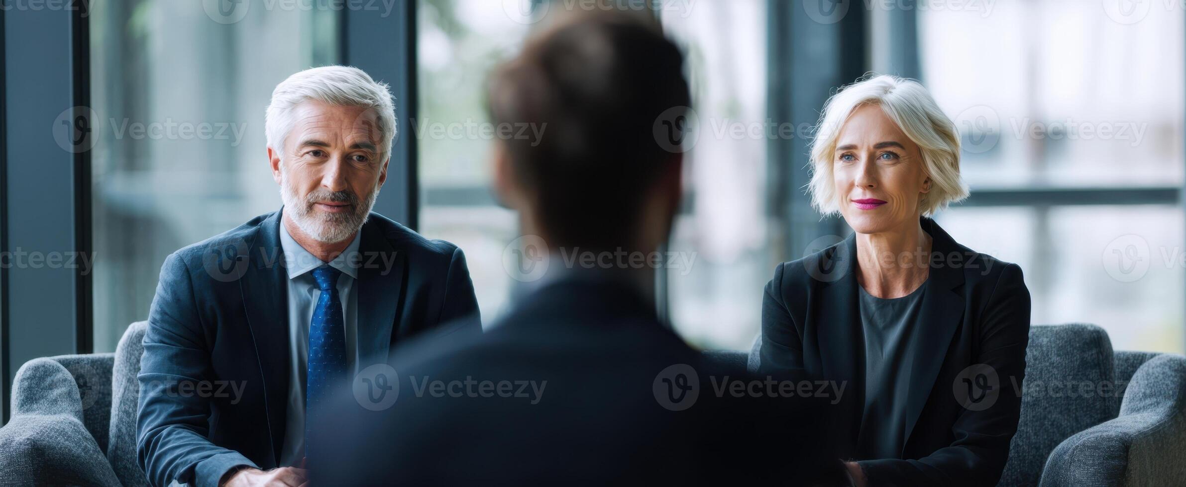 The professional discussion between two executives in a modern business environment. photo