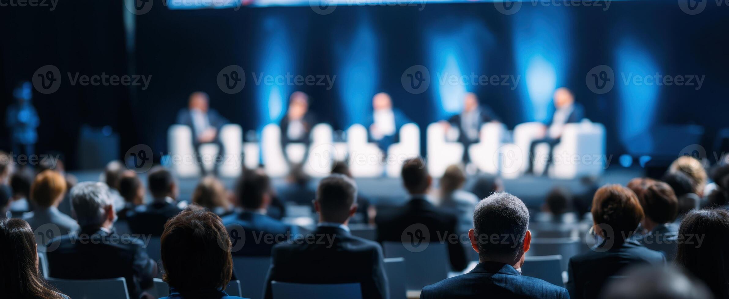 The engaging panel discussion on innovation and business strategies at a corporate event. photo