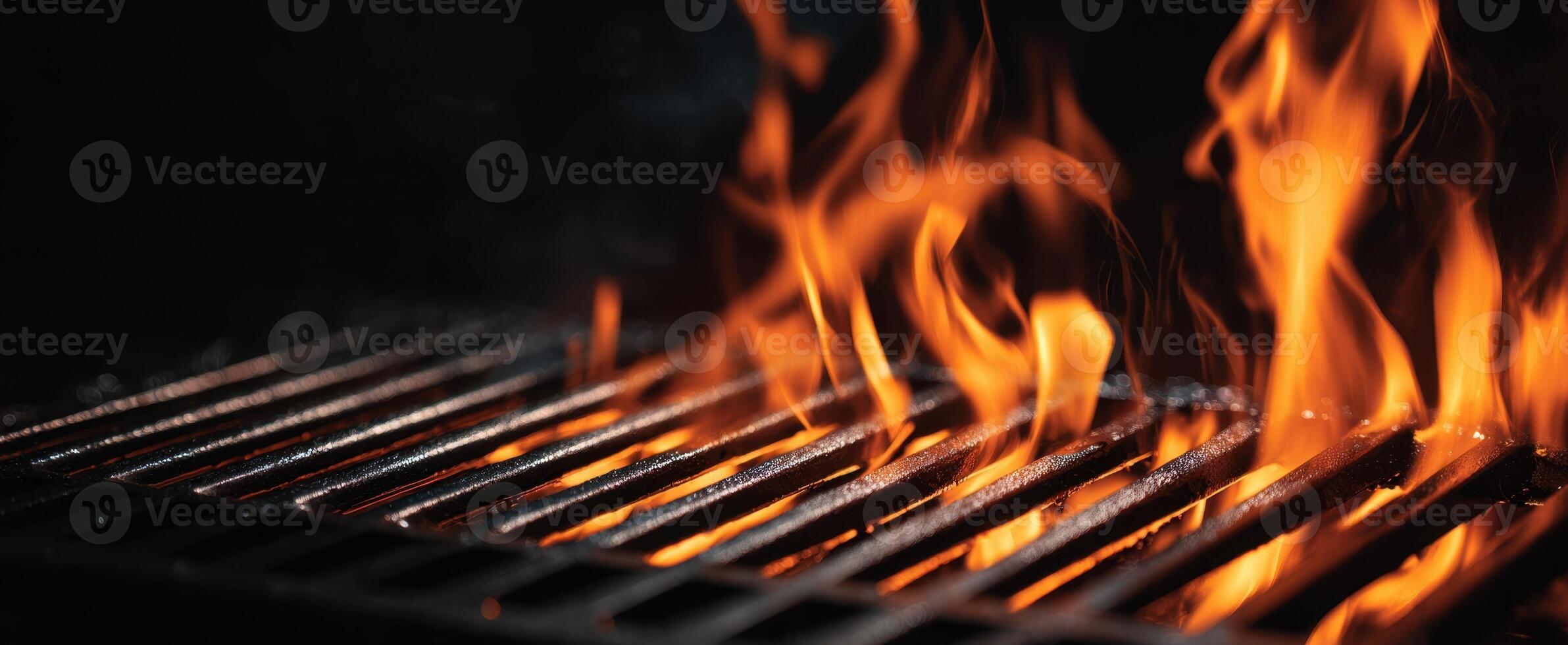The vibrant flames dancing on a grilling surface create a stunning culinary backdrop. photo