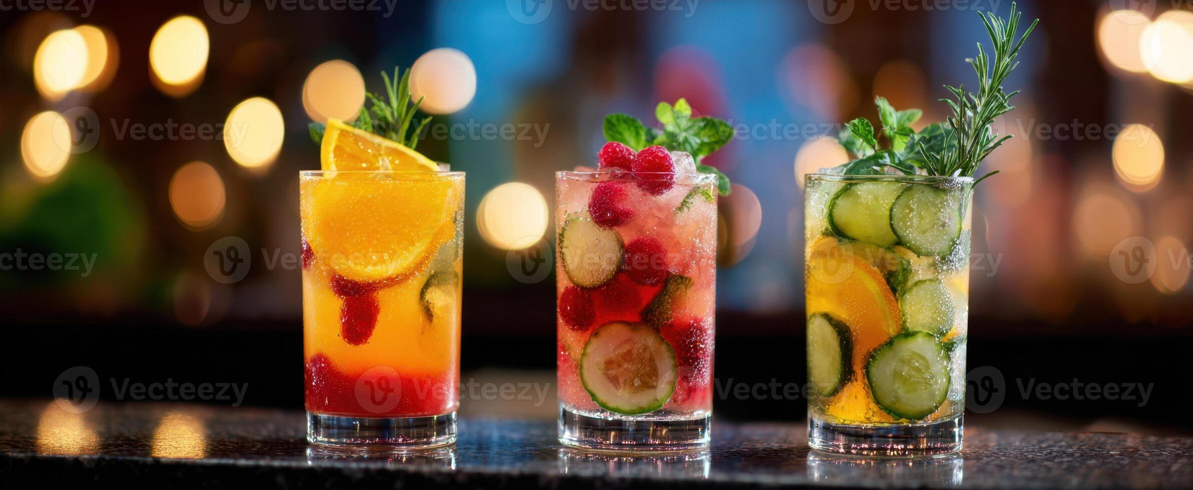 The vibrant assortment of refreshing cocktails with fruits and herbs. photo