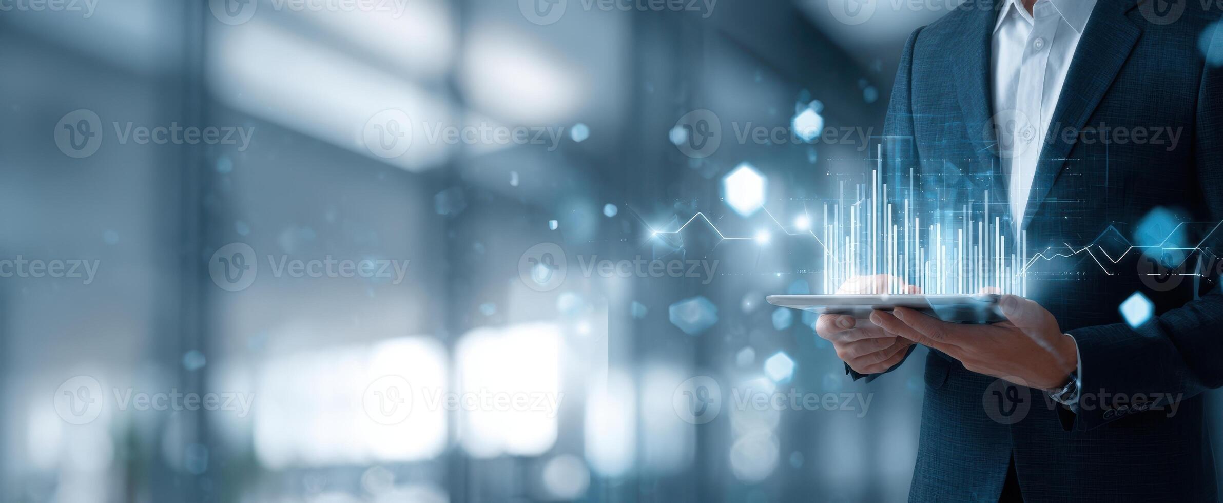 The businessman analyzing data trends using a modern tablet in a professional setting. photo