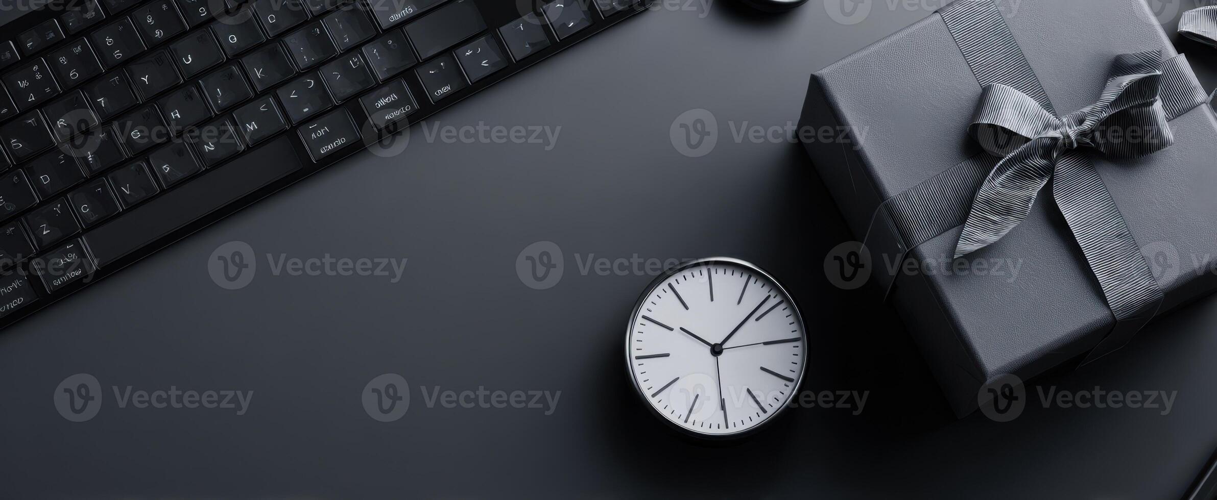 The elegant clock and gift arrangement on a sleek workspace. photo