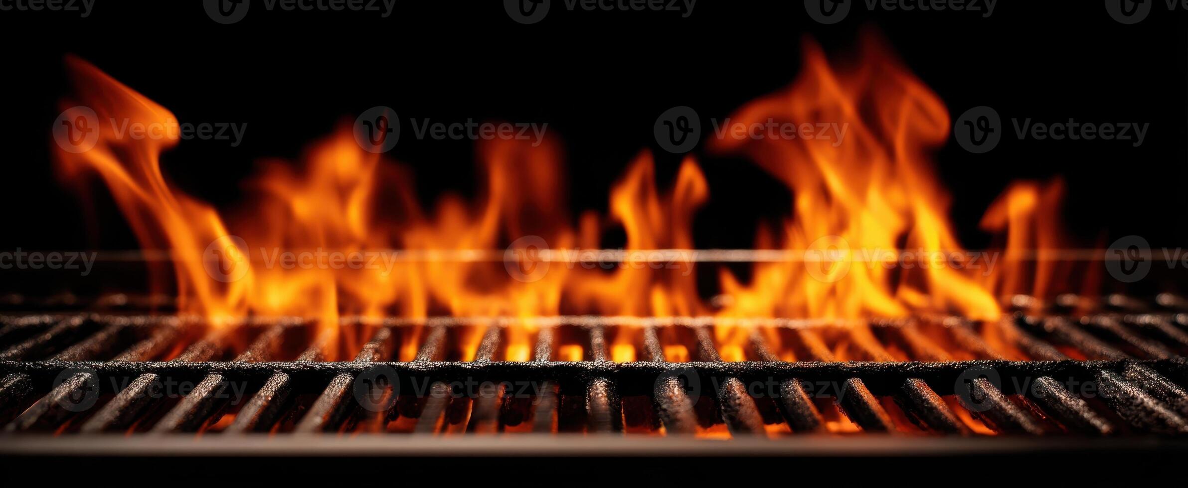 The fiery barbecue grill igniting flames for a perfect cooking experience photo
