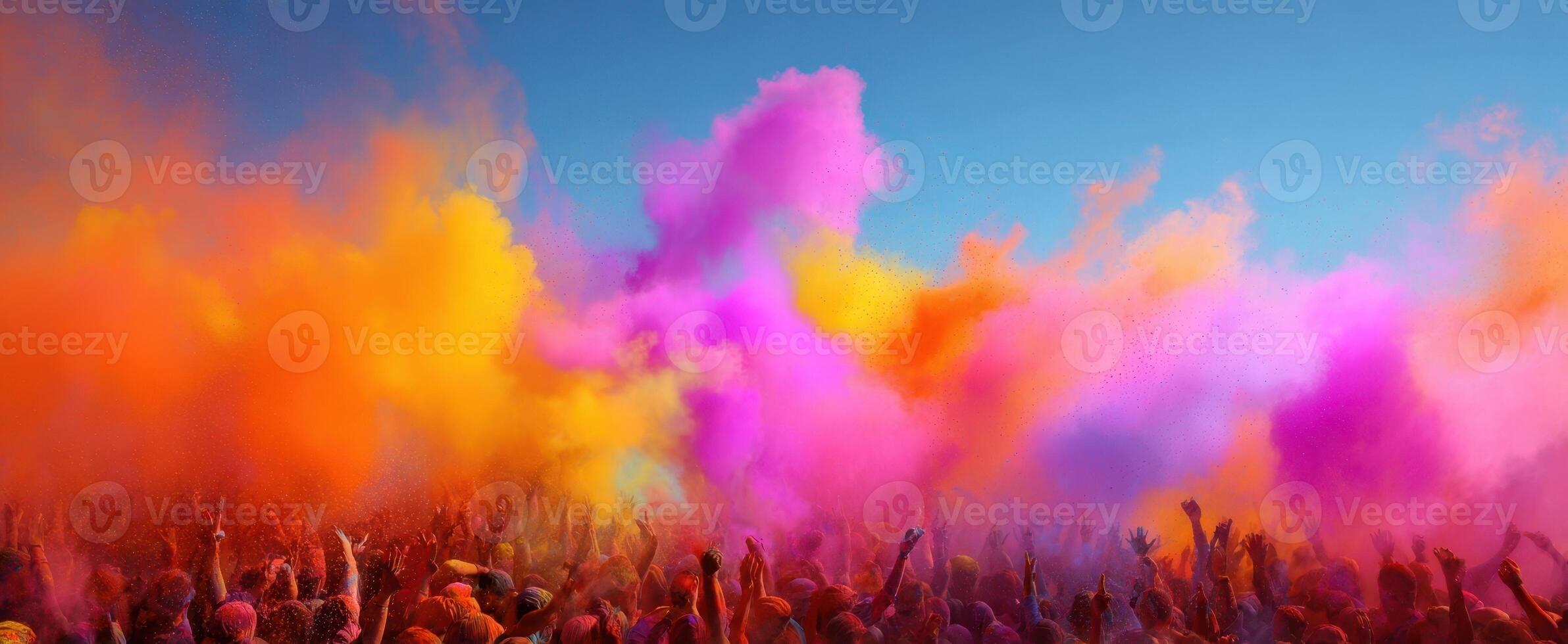 The vibrant celebration of colors at a dynamic outdoor festival. photo