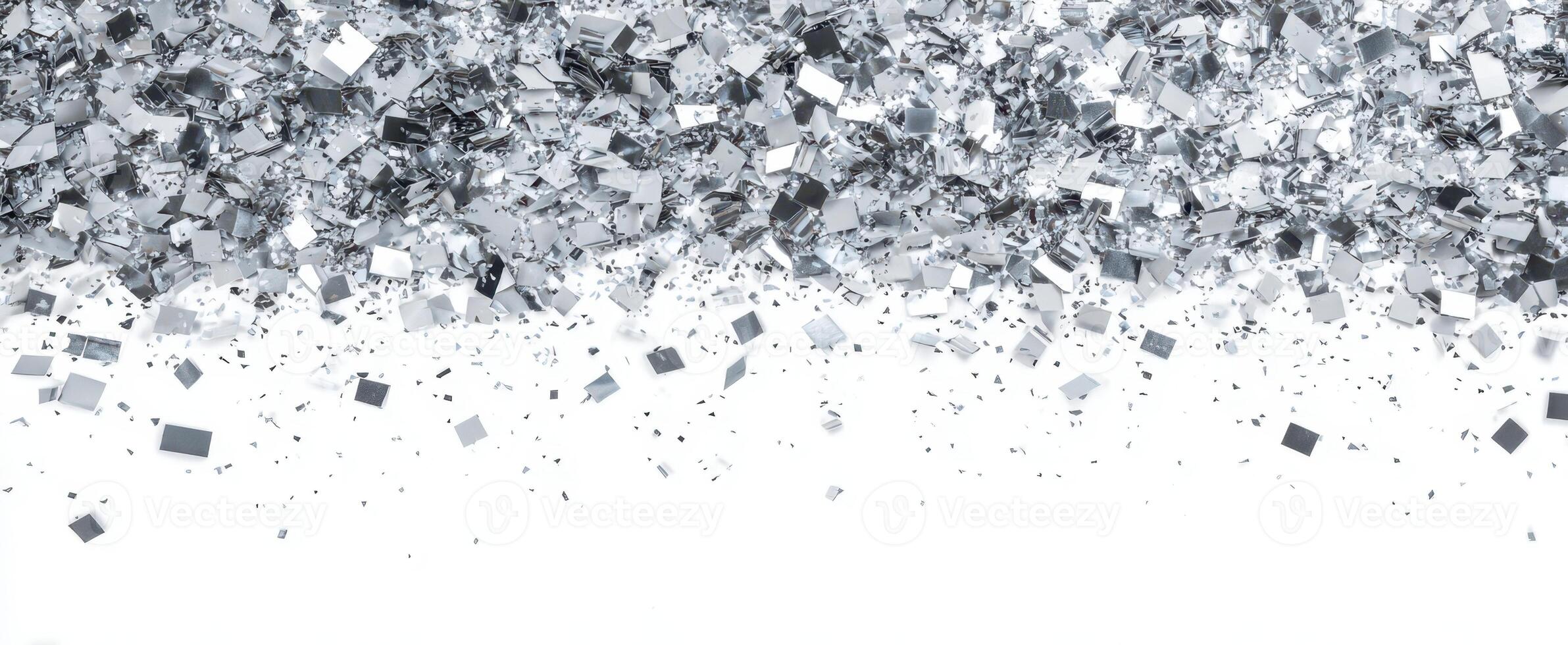 The shimmering silver confetti creating a festive background for celebrations. photo